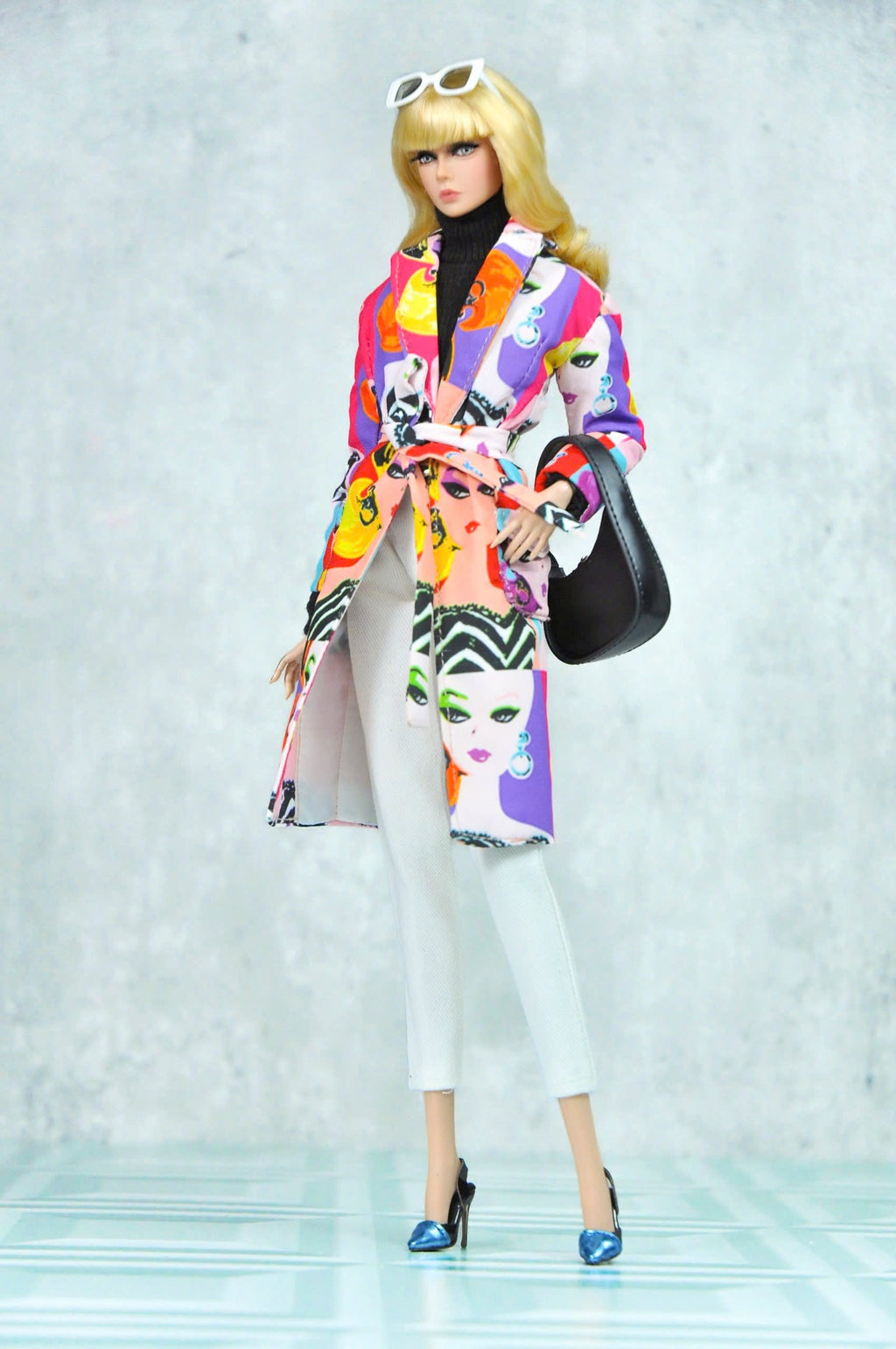 BARE DELUXE pop art portrait coat styled on a fashion doll; coat and matching belt only